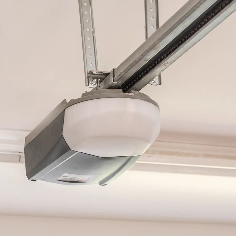 Garage door opener mounted on ceiling